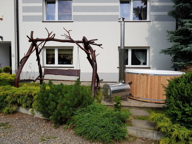 Relax after fishing in hot tub. Fishing lodge in Poland, comfortable