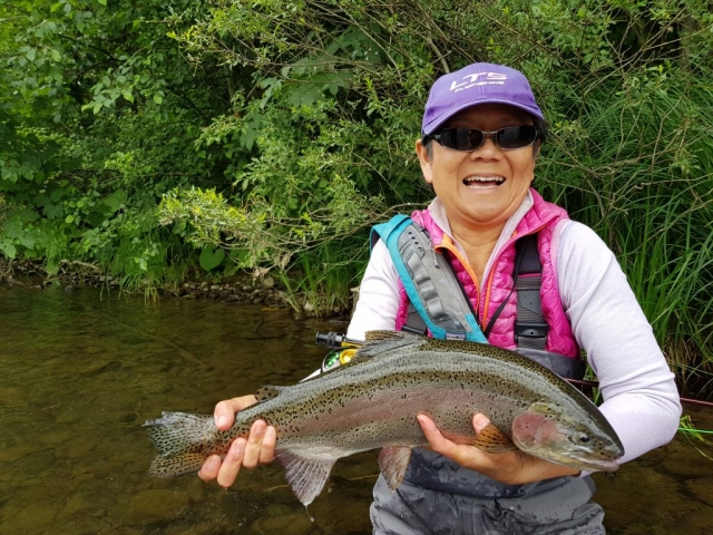 Donna with big Rainbow Trout from Vah River - Slovakia