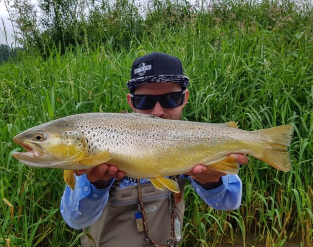 Vision waders, professional guide and his Brown Trout