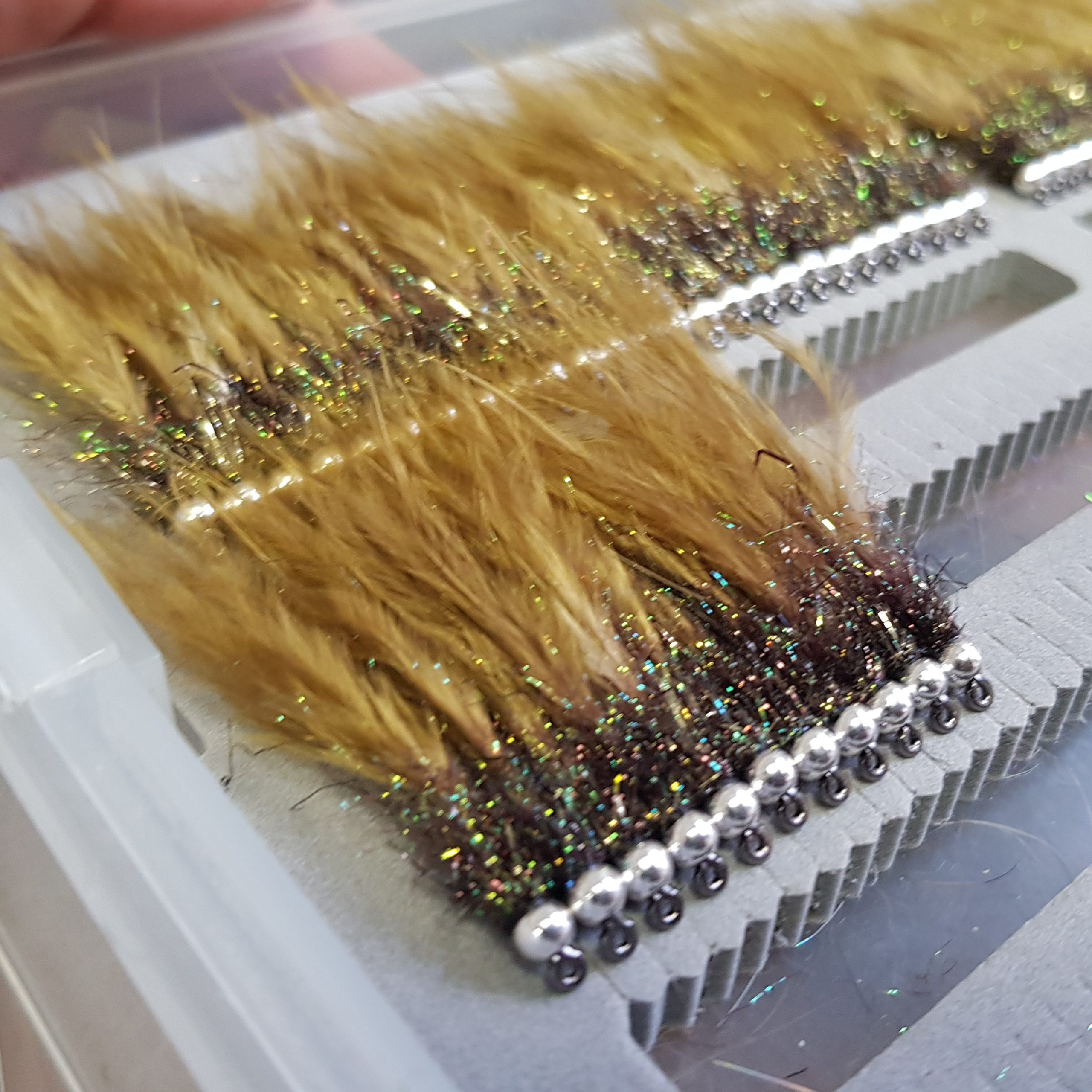 Small Spanish streamers for brown trout,olive marabou tail + spectra dubbing