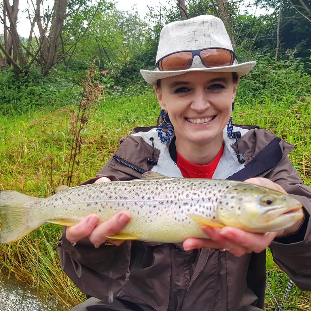 Girls like fishing as well. Wife with nice brown trout.