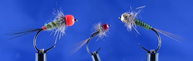 Little nymphs for trout. Body glass, Akita, Hare's ear dubbing, orange bead