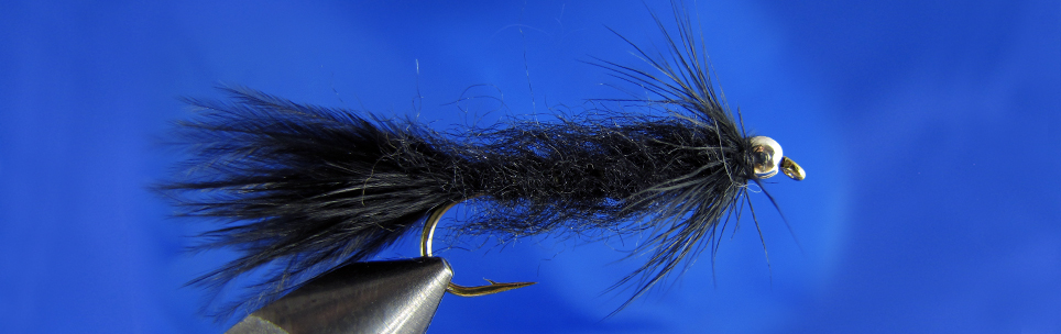 Leech for trout, marabou tail, black dubbing body, black hen feather, gold tungsten bead